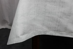 Tovaglia Astro argento fondazione Umberto Veronesi Tessitura Randi