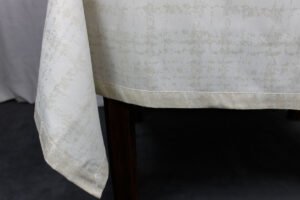 Tovaglia Astro oro fondazione Umberto Veronesi Tessitura Randi